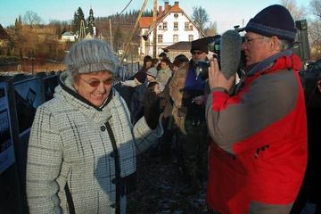 Po mszy – do galerii na płocie